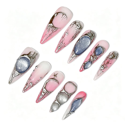 Pink ombre nails with sculptural silver details and blue-gray shimmer