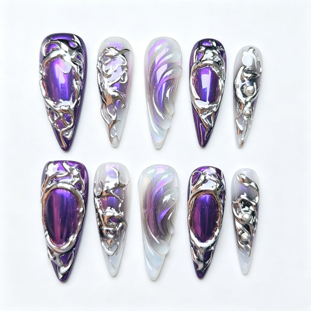 Amethyst Veil purple and silver stiletto nails with iridescent accents