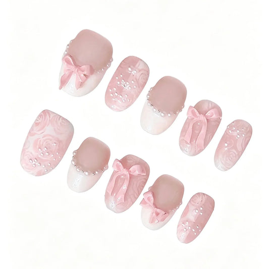 Pink Bow Pearl Press-On Nails featuring coquette, balletcore, romantic, bridal details on reusable handmade press-on nails