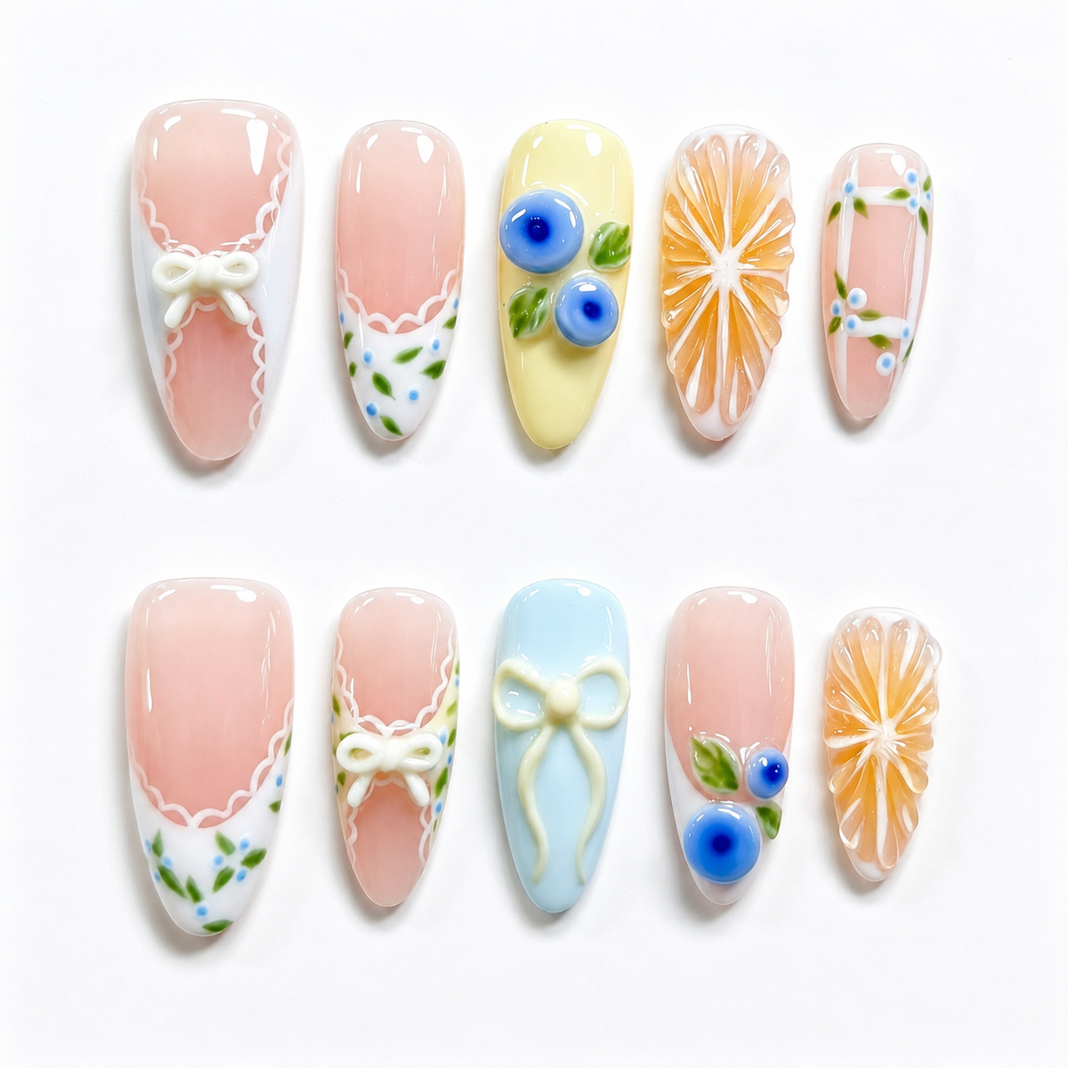 Berry Citrus pastel almond nails with blueberries, citrus slices, bows and flowers