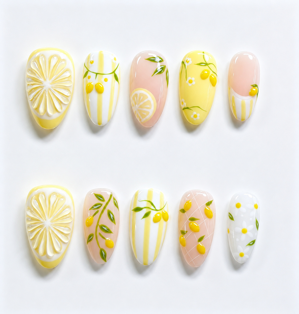 Lemon Bloom oval nails with yellow citrus slices, daisies and green leaves